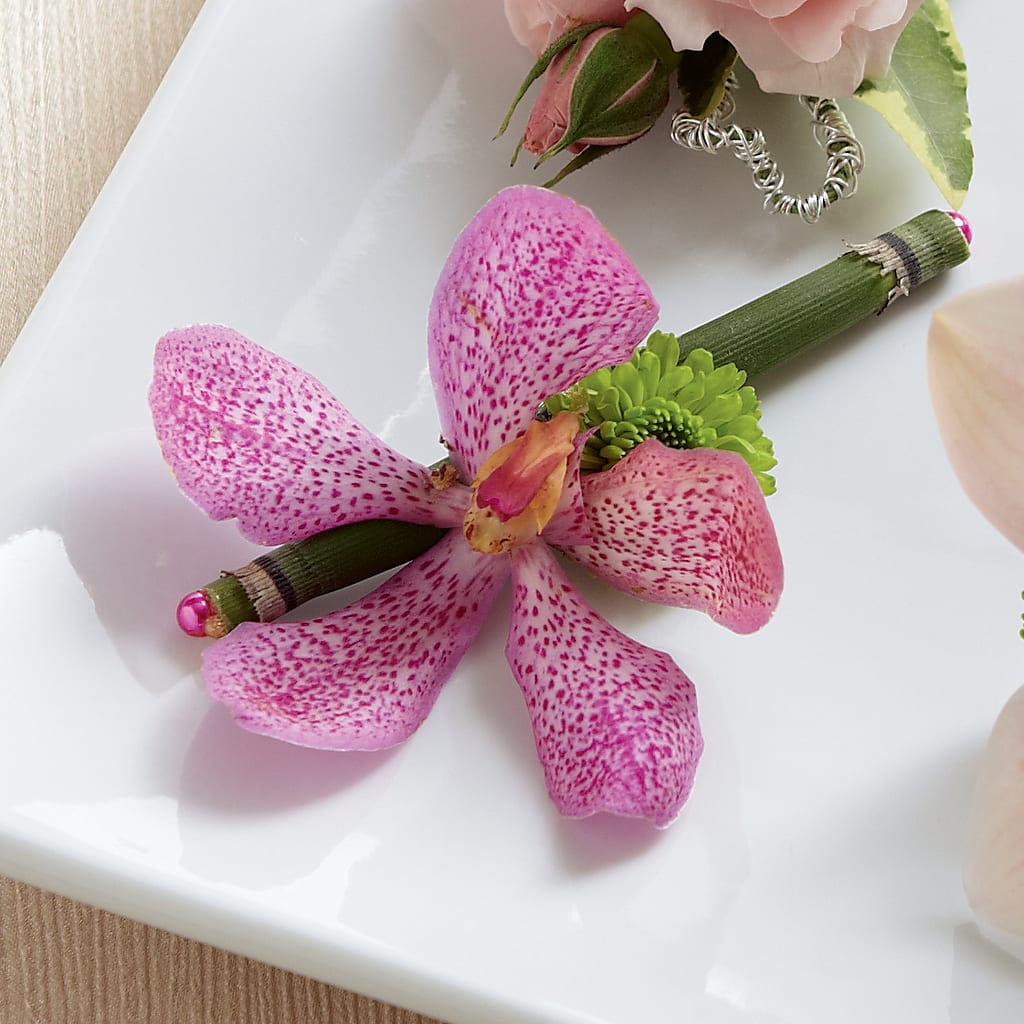 Pink Mokara Boutonniere – RESILIENT ROSES FLORAL & DECOR LLC, Jacksonville FL