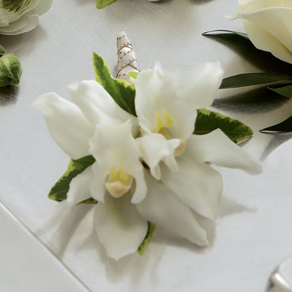 White Mini Cymbidium Boutonniere – RESILIENT ROSES FLORAL & DECOR LLC, Jacksonville FL